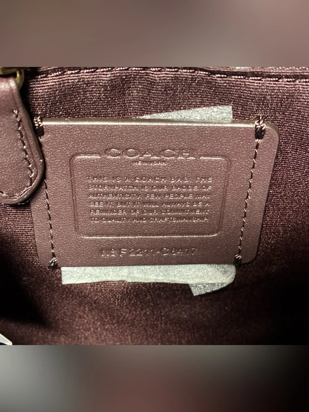 Coach burgundy pink